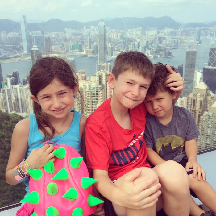 Enjoying the view after riding the tram rail car to the Peak.