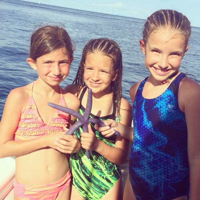 So excited to find a purple starfish! (yes, we put it back)