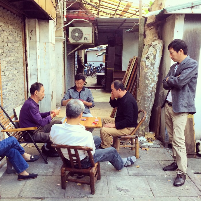 Gathered around an intense game of cards...