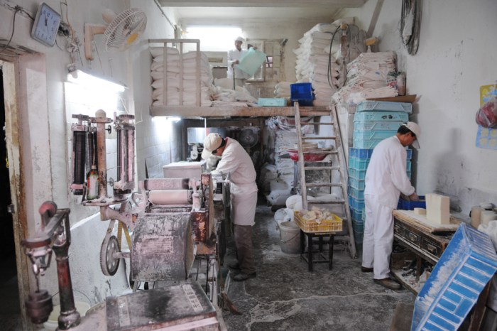 A local noodle factory which was surprisingly open to the public. I was standing on the sidewalk for this photograph.