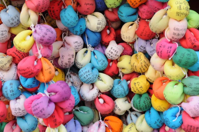 Surrounding the shrine are notes left in hopes of granting wishes.