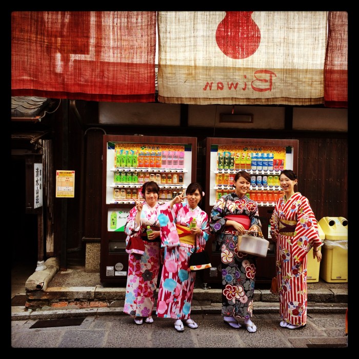 So much of this photo represents Kyoto. Rental Kimonos, vending machines,
