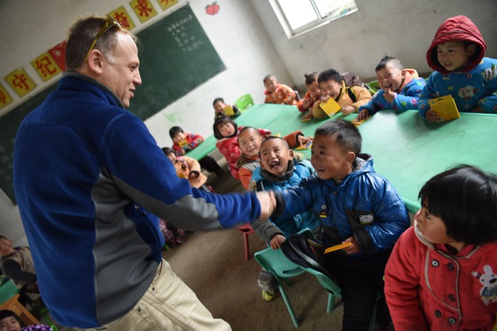 Each student at every school we visited received a box of crayons and three pens. This alone created so much happiness.